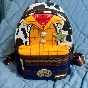 LOUNGEFLY PIXAR Toy Story Themed Backpack with Brown and Yellow Accents